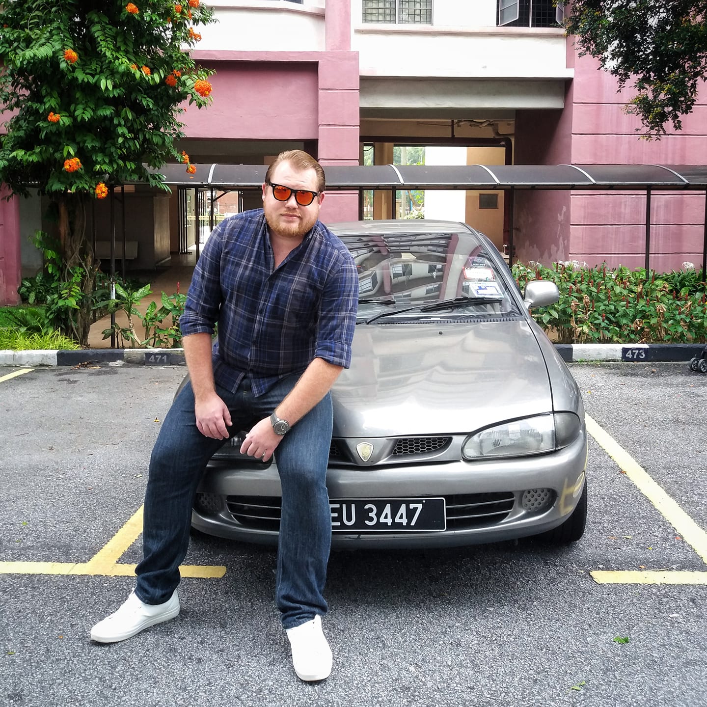 Rhys and his Malaysian ride, the legendary Wira.