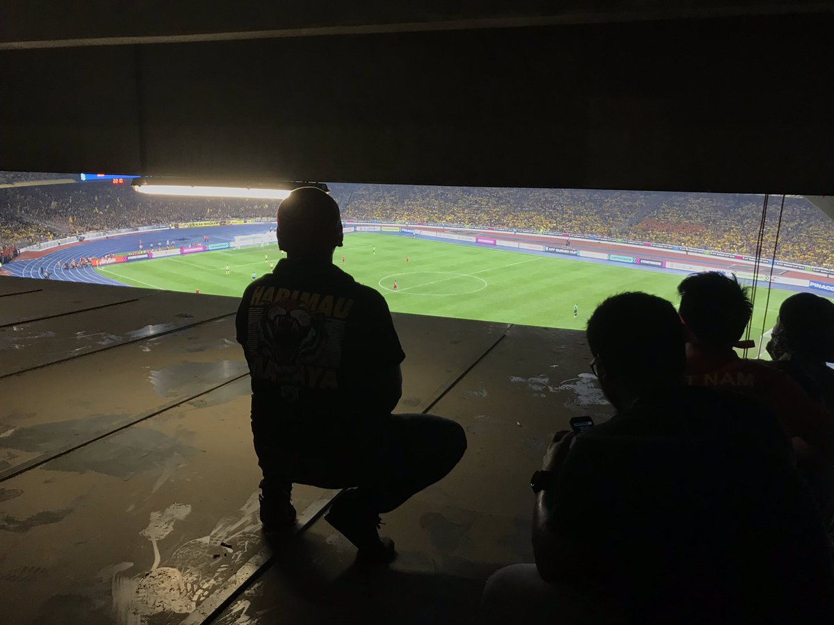 Only God knows where did they climb up to watch the match.