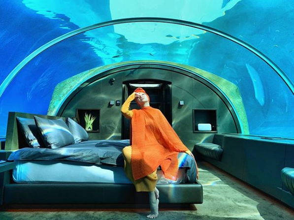 Maybe she's having a headache looking at her hotel bill?