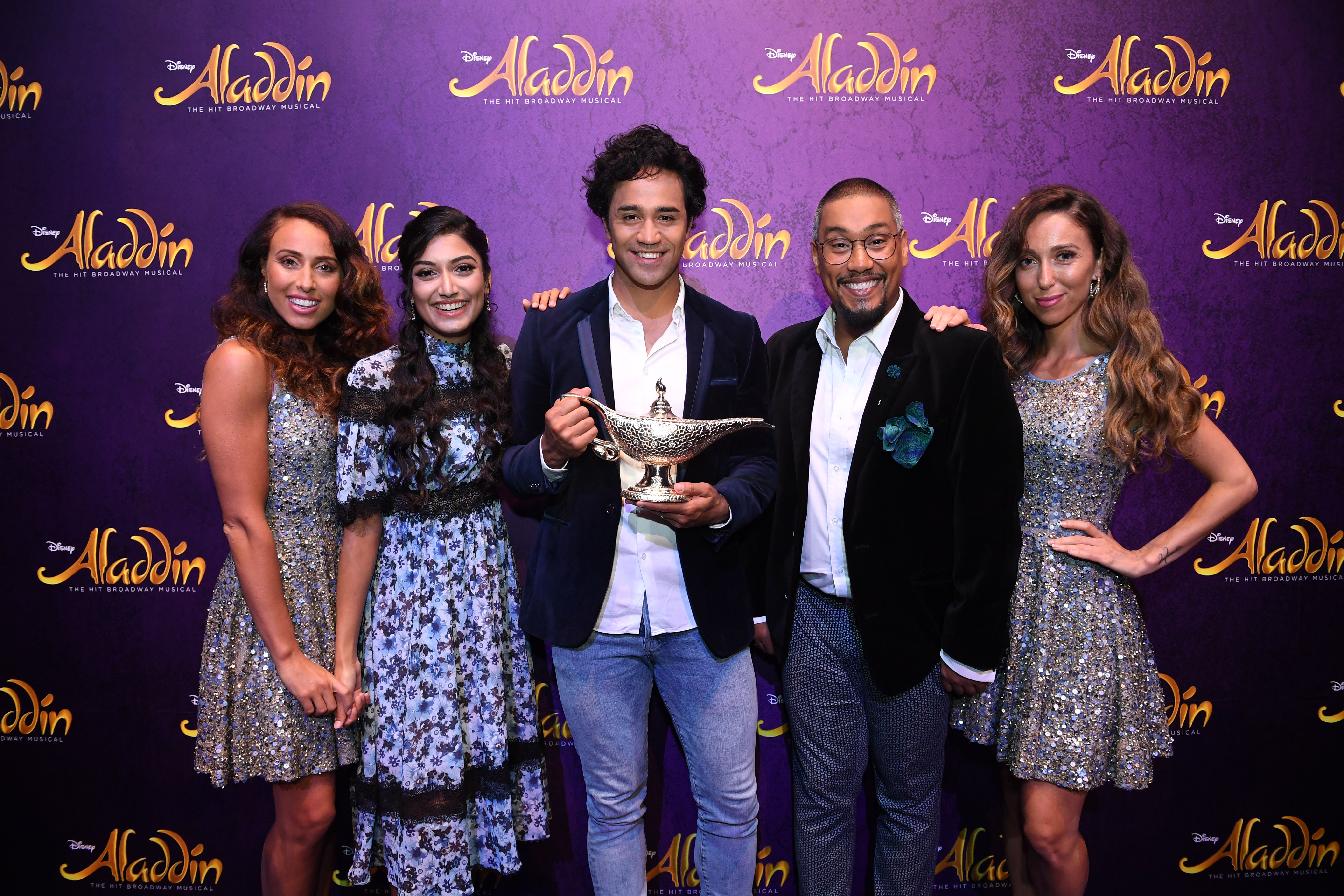 The main cast with two supporting ladies