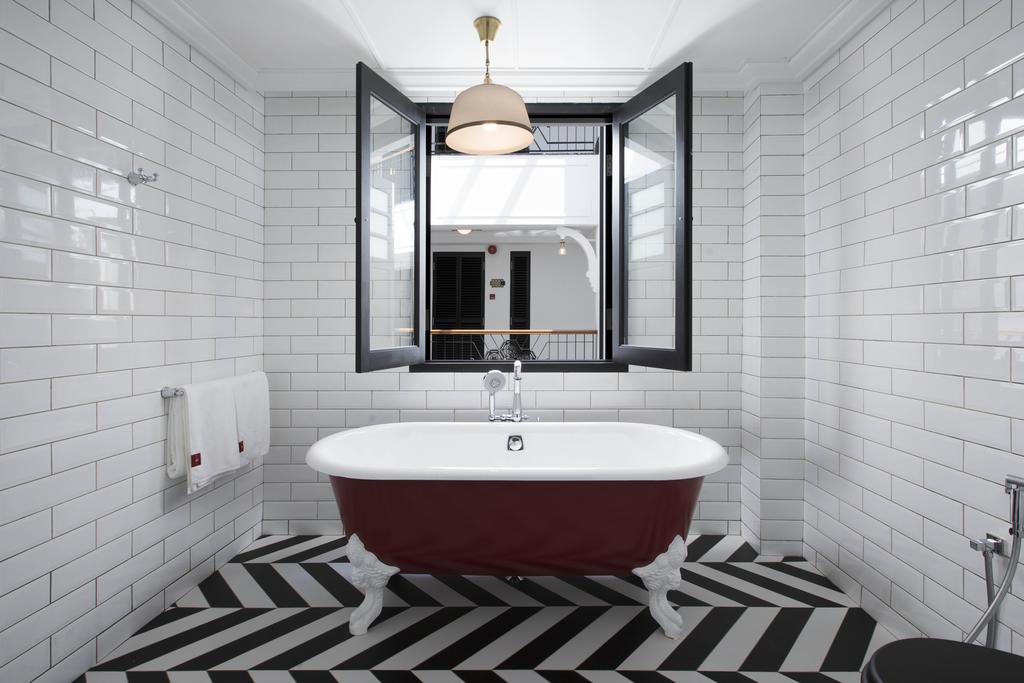 Wind down in this super cool bath tub at the end of the day.