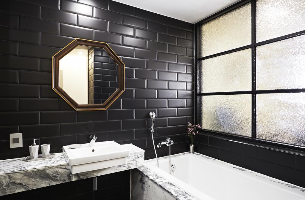 A pretty bathroom to match your dark soul.