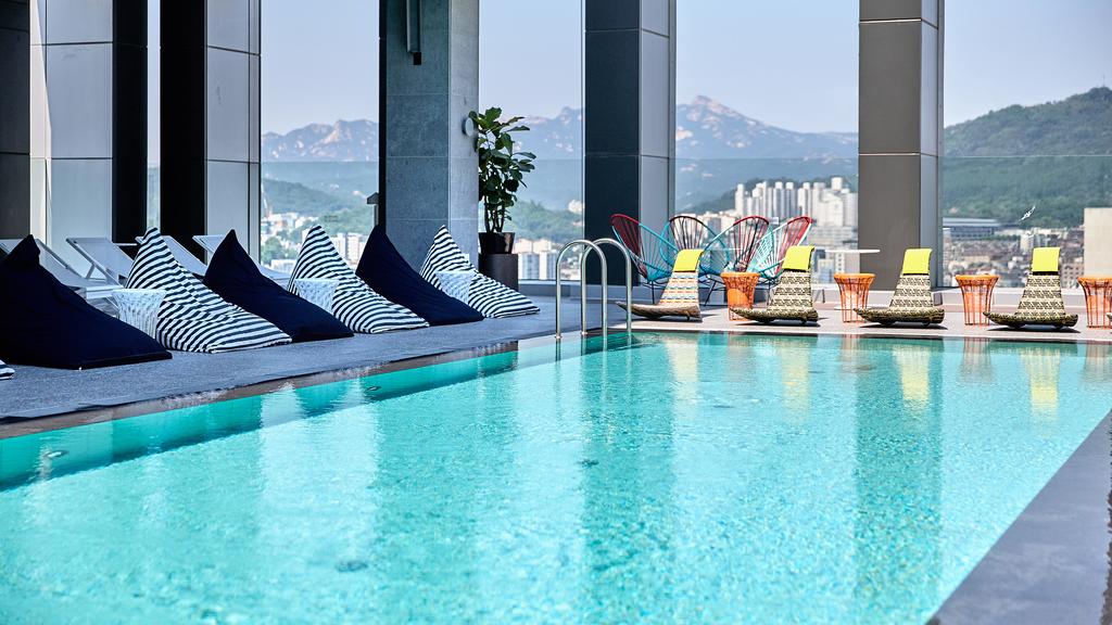 Just imagine yourself lazing around this rooftop pool.