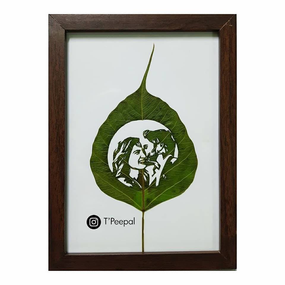 Get a portrait...carved on a leaf.