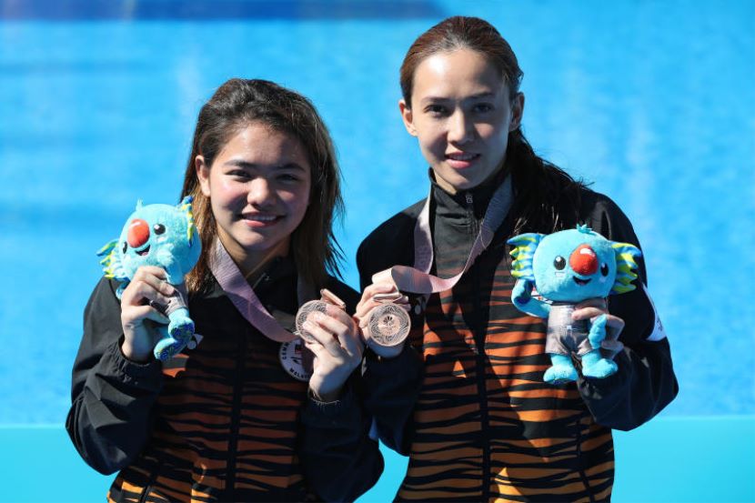 Bersama rakan seperjuangan, Leong Mun Yee.