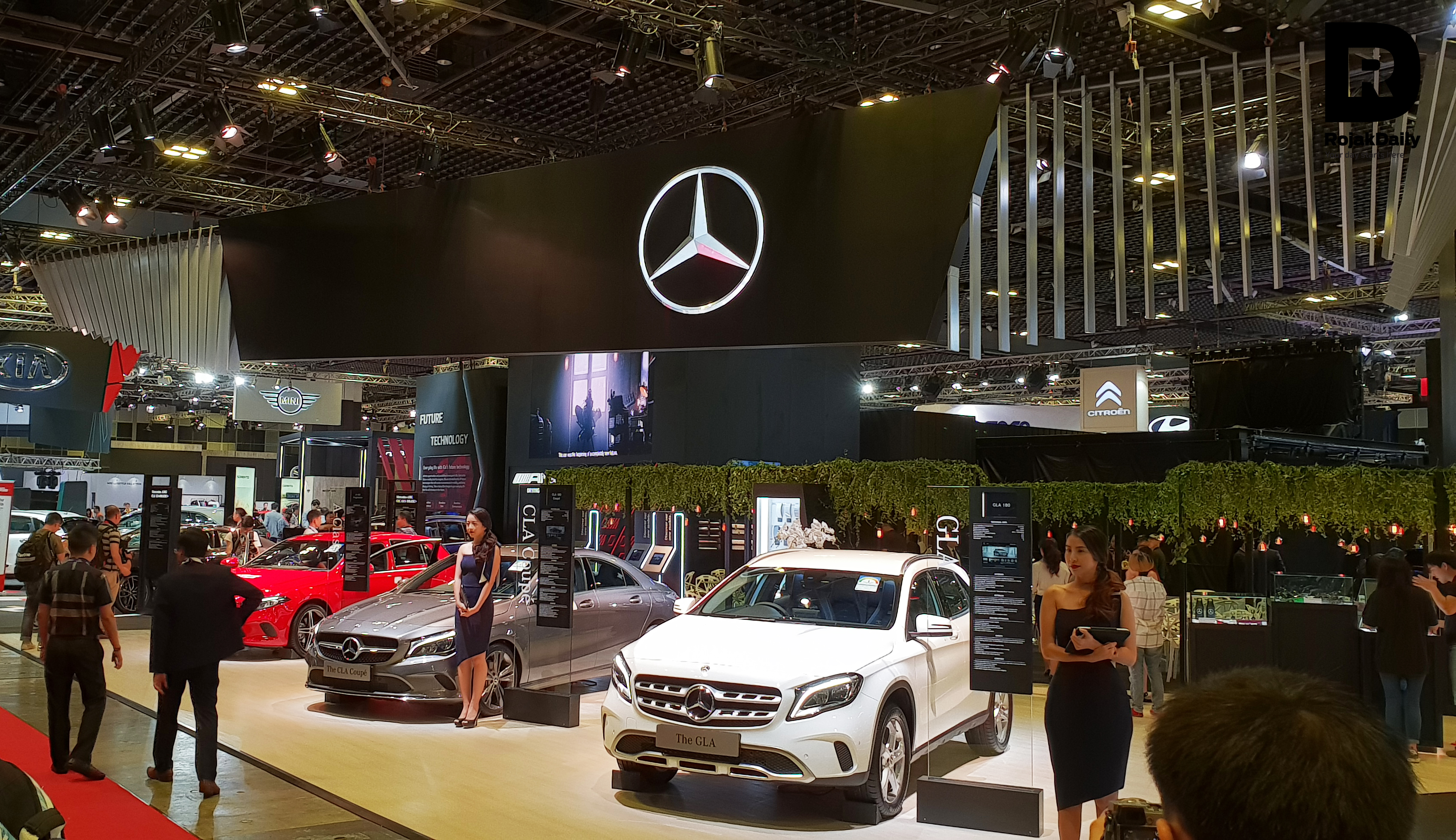 Showgirls and showcars.