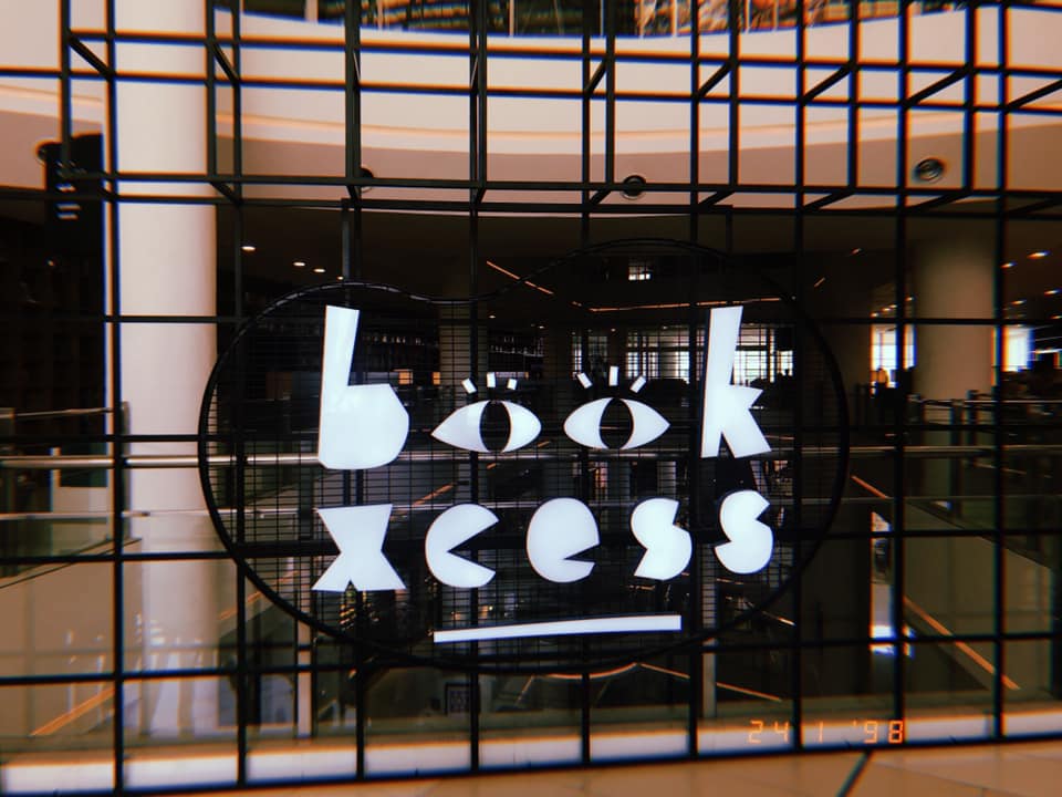 You'll be greeted by this sign after coming off the escalator.