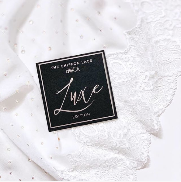 dUCk Scarves Swarovski crystals can rain on our parade.