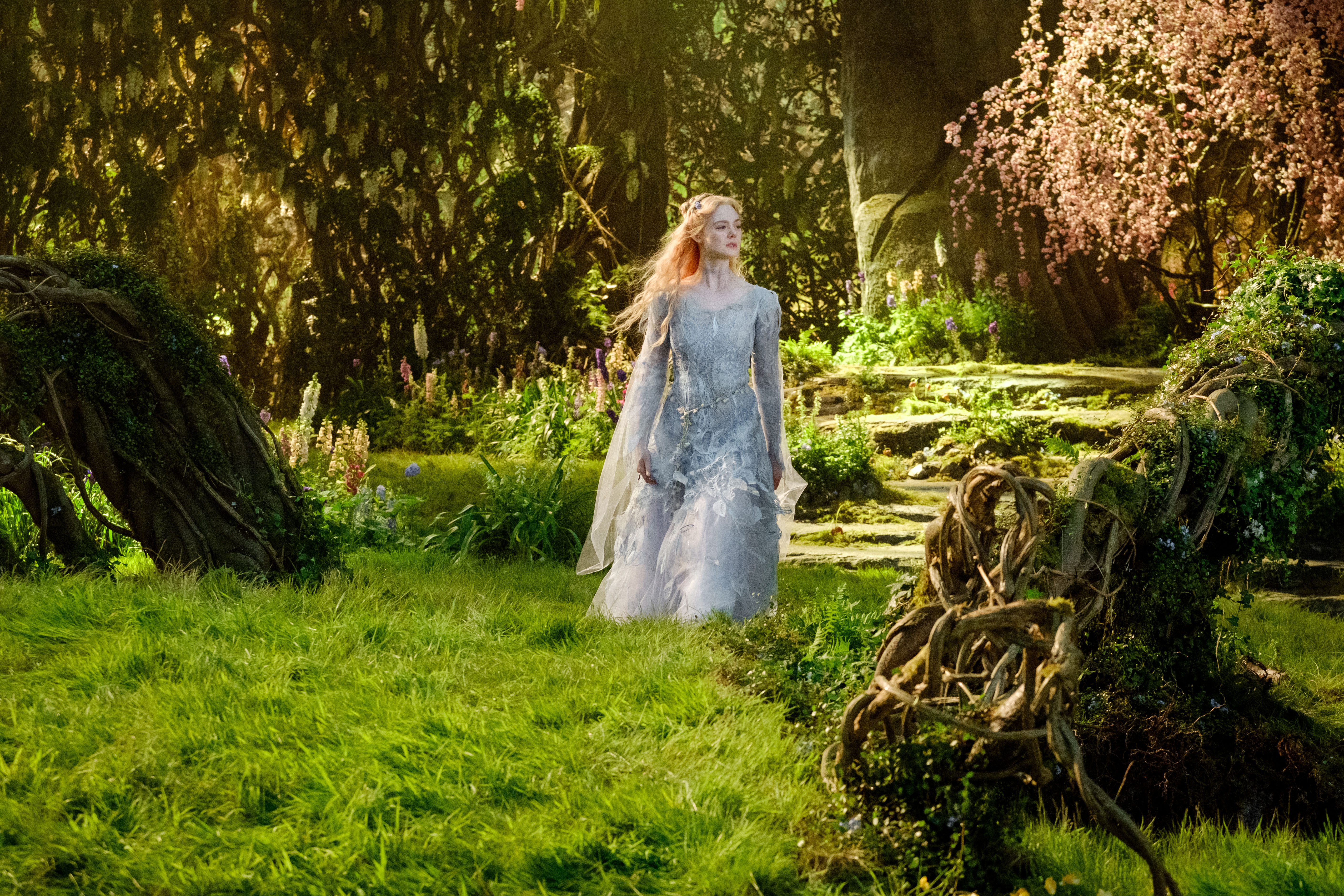 Disney We need Elle Fanning's dresses ASAP!