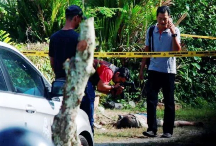 Police at the crime scene in Bukit Mertajam
