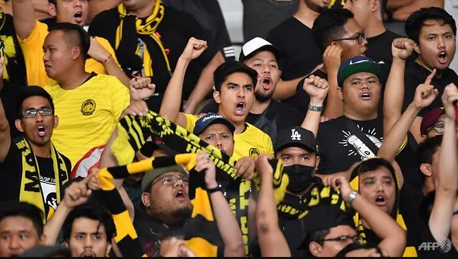 Syed Saddiq cheering on Harimau Malaya.