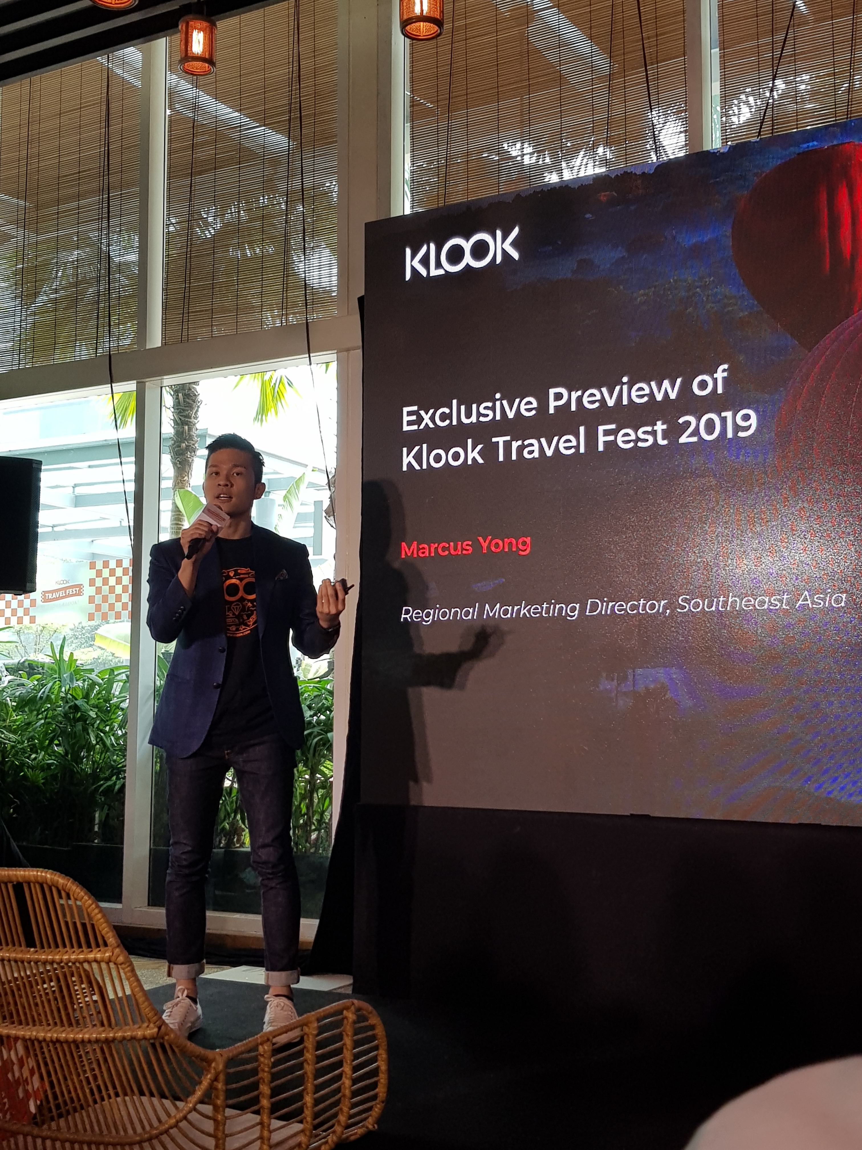 Marcus Yong speaking to the media about Klook Travel Fest