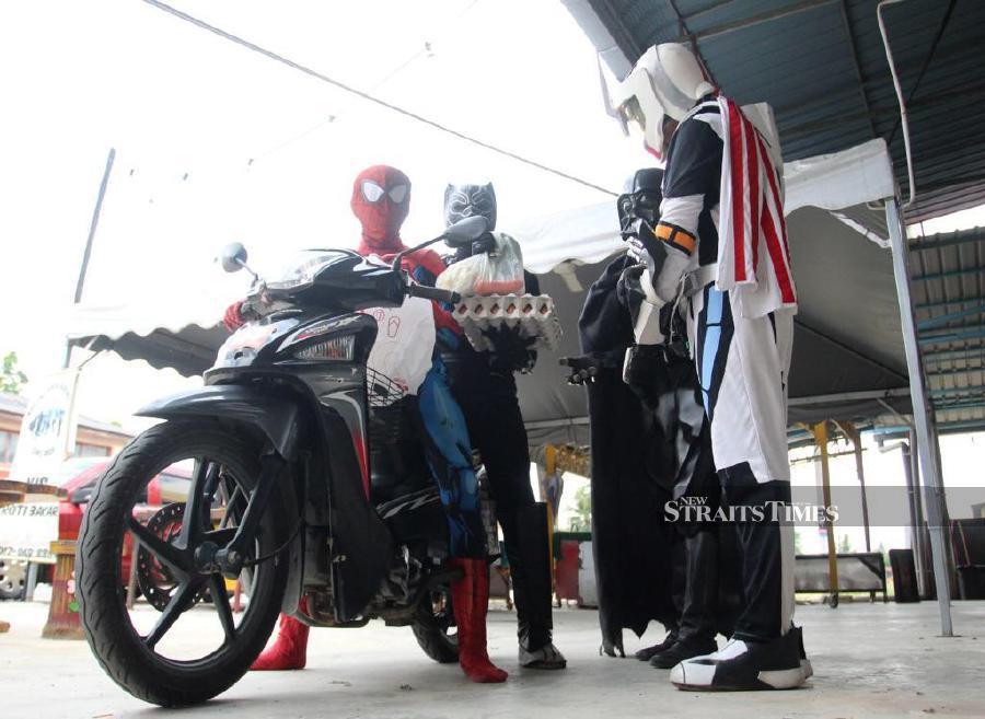 New Straits Times Superheroes doing grocery run.