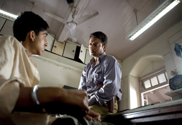 As a cop in 'Slumdog Millionaire'.