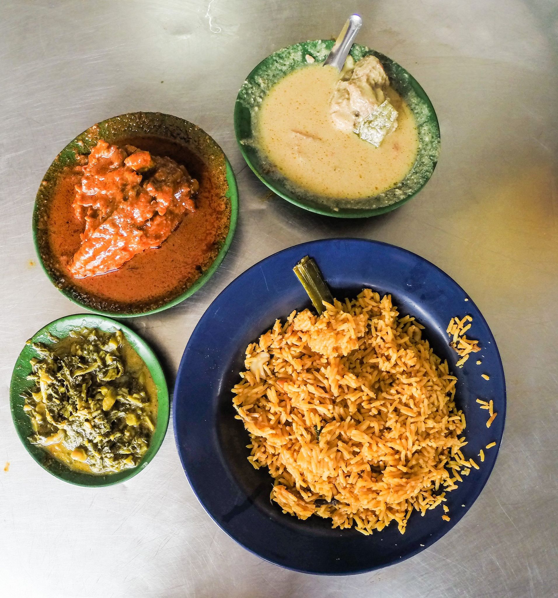 Ayam Ros, Mutton Kurma, greens and briyani rice.