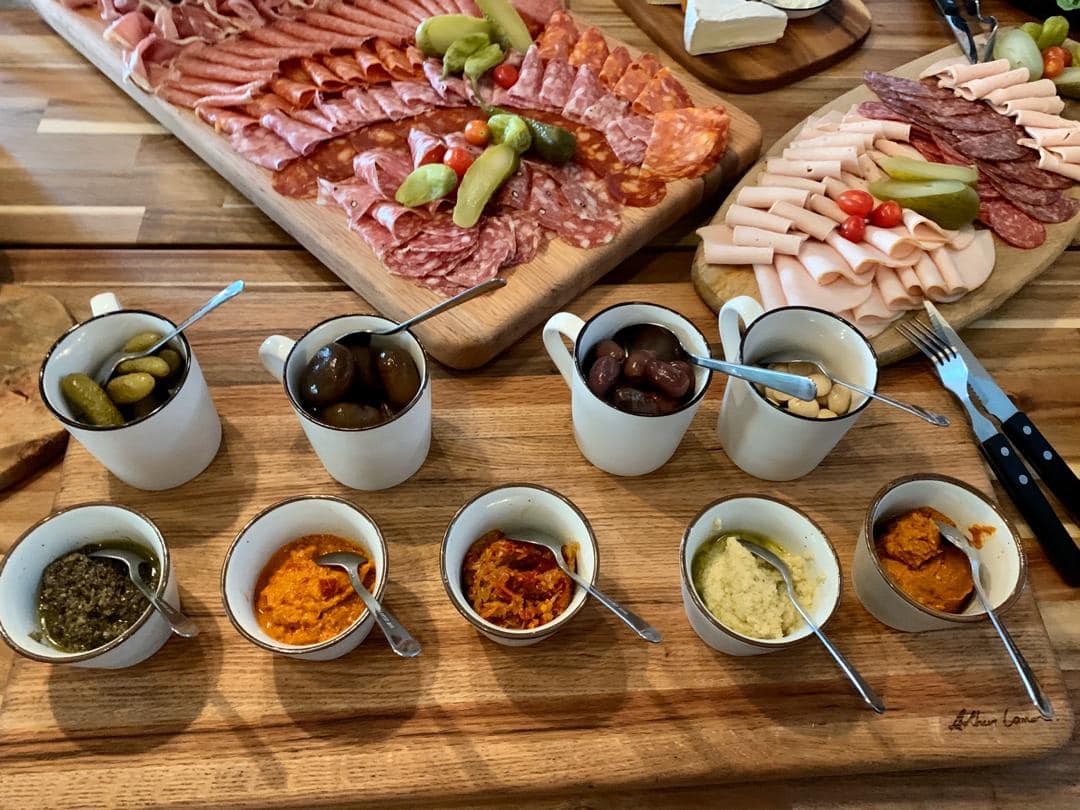 Cured meats with condiments.