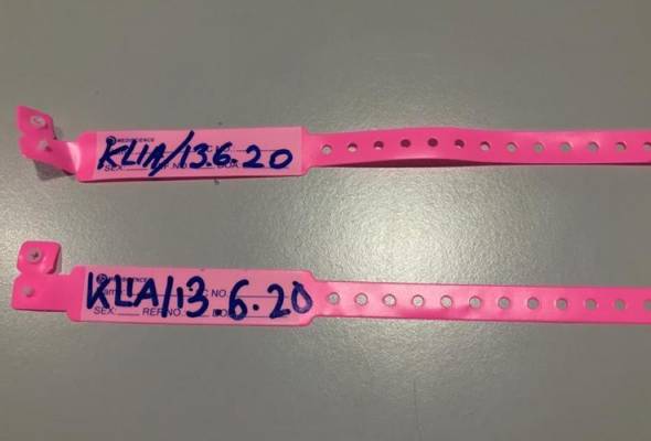 The infamous pink wristband.