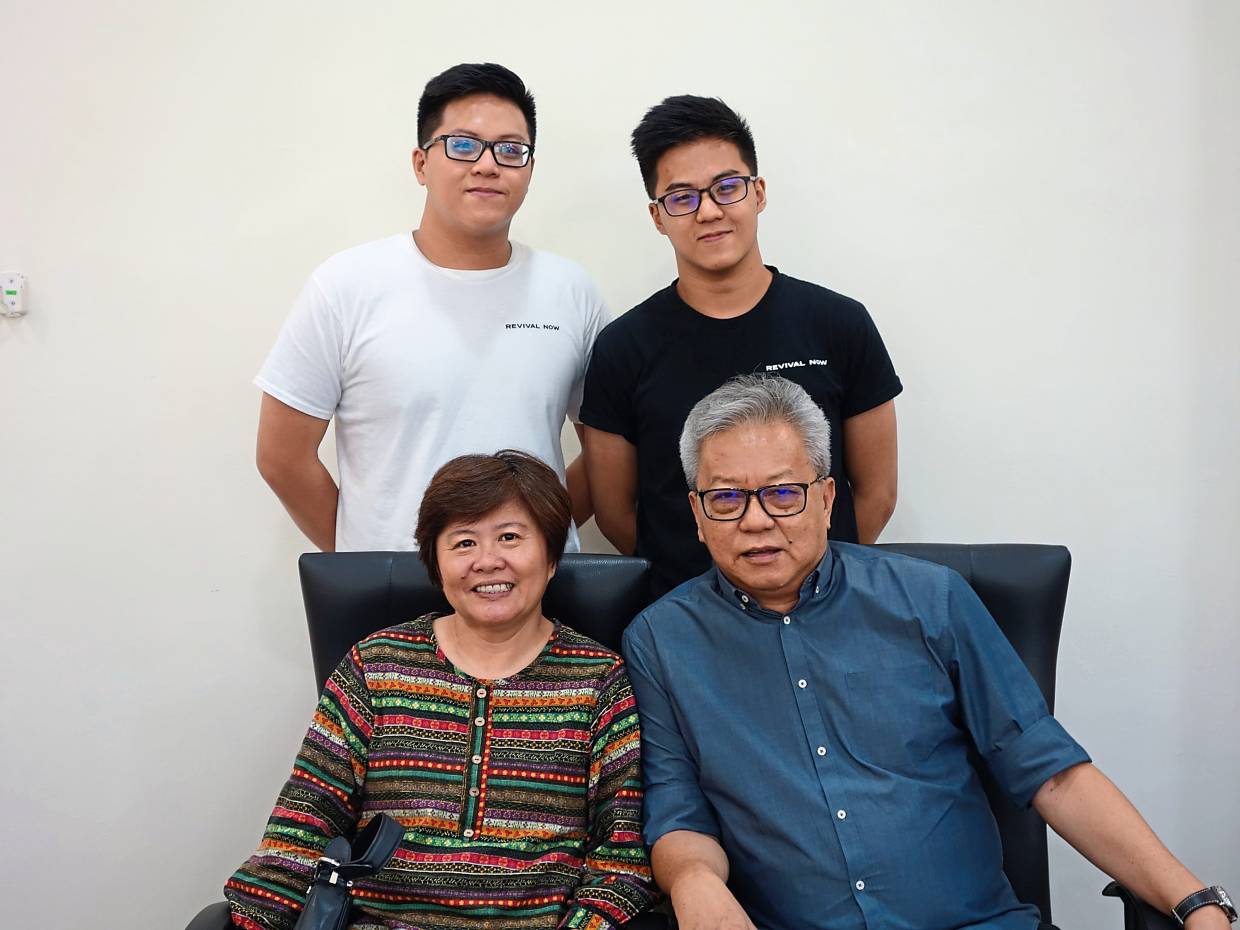 Proud Asian parents.