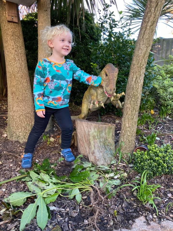 Little Theo now has a giant dinosaur friend.