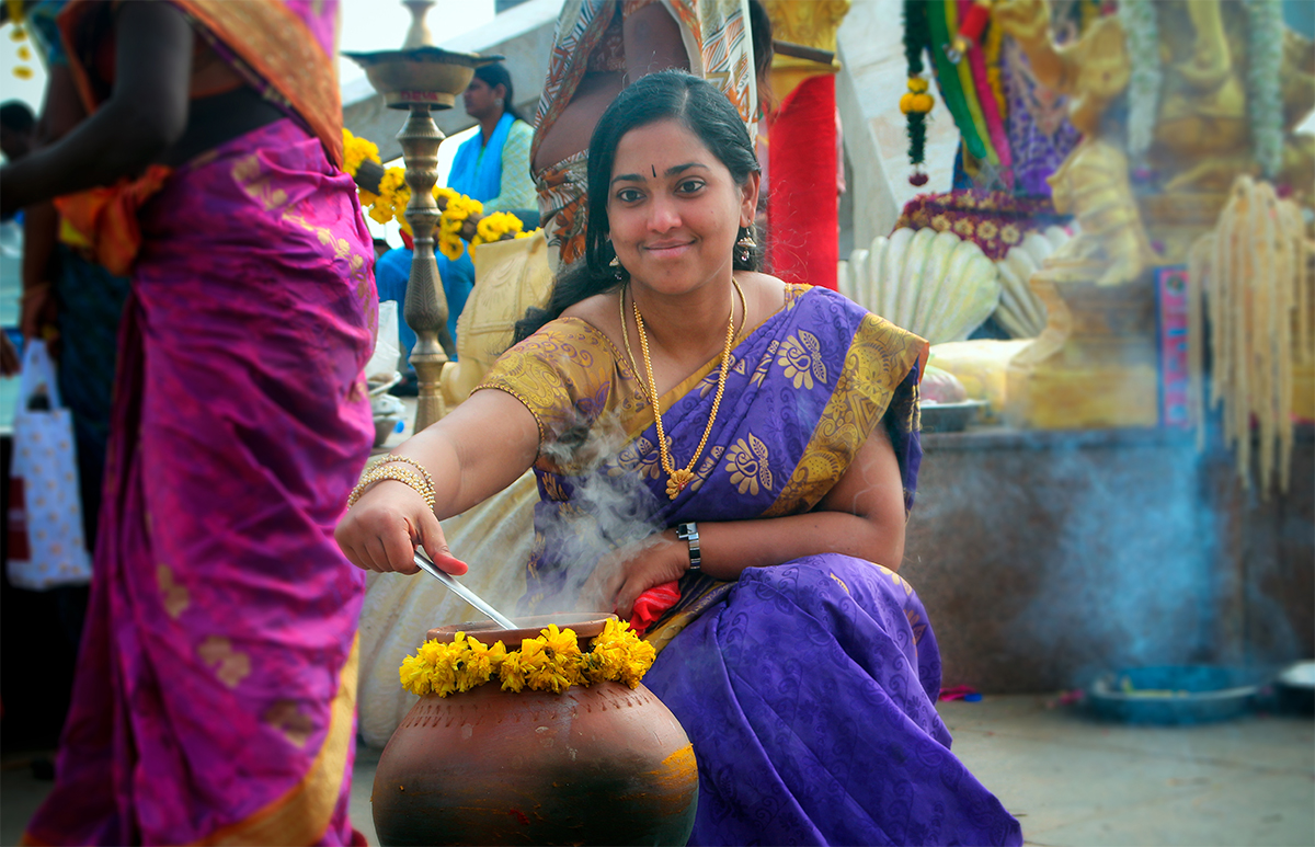 A clay pot is traditionally used to cook Ponggal.