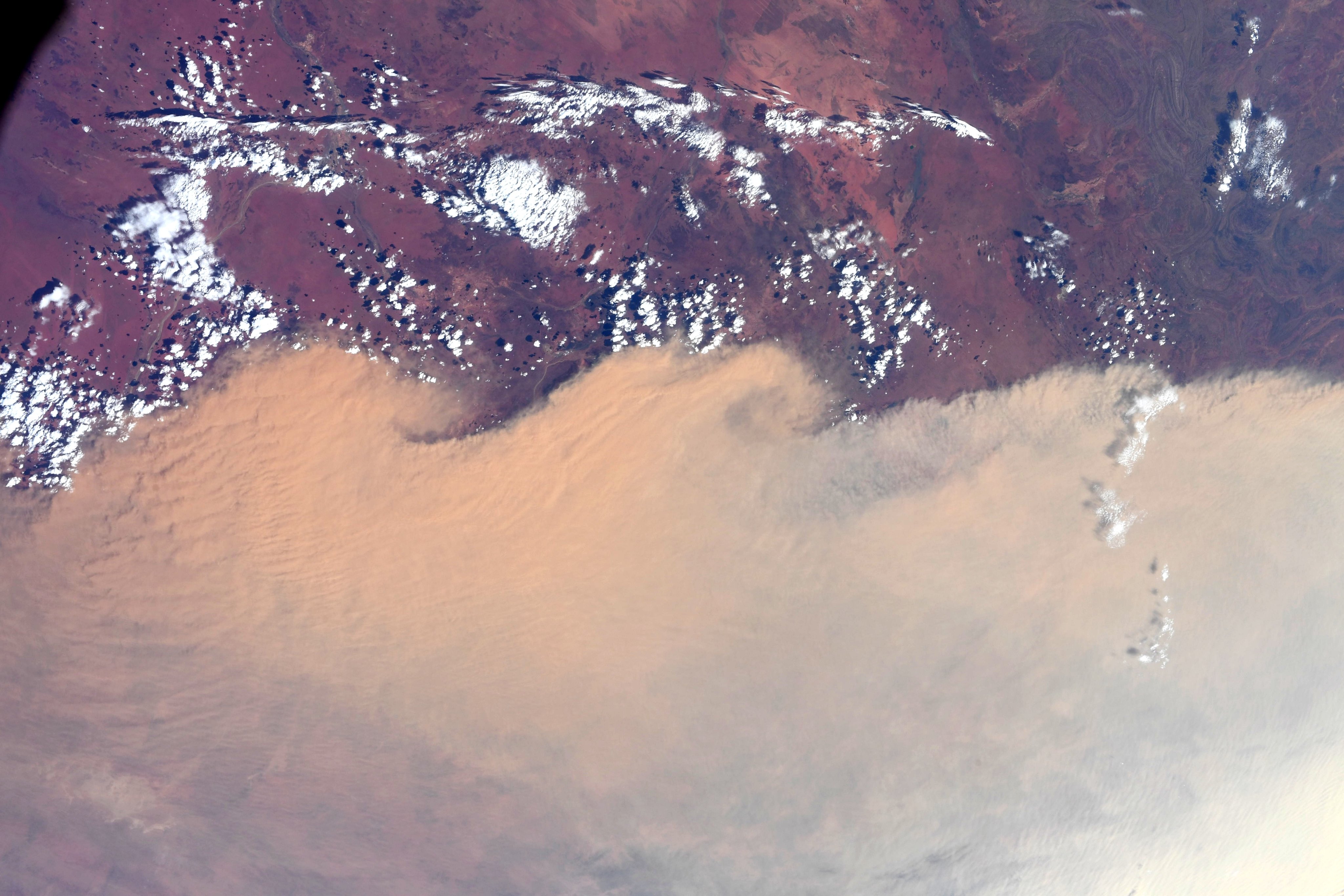 Christina H Koch You can literally see a thick blanket of smoke above the Earth's atmosphere.
