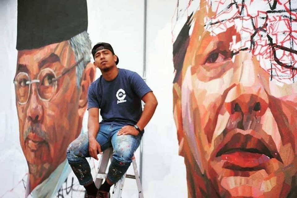 Muhammad Suhaimi and his proud portrait.