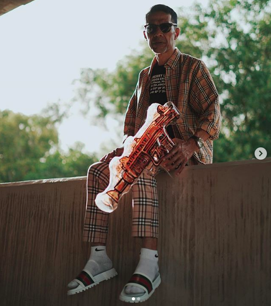 He got some Burberry, some Gucci, he's LIT!