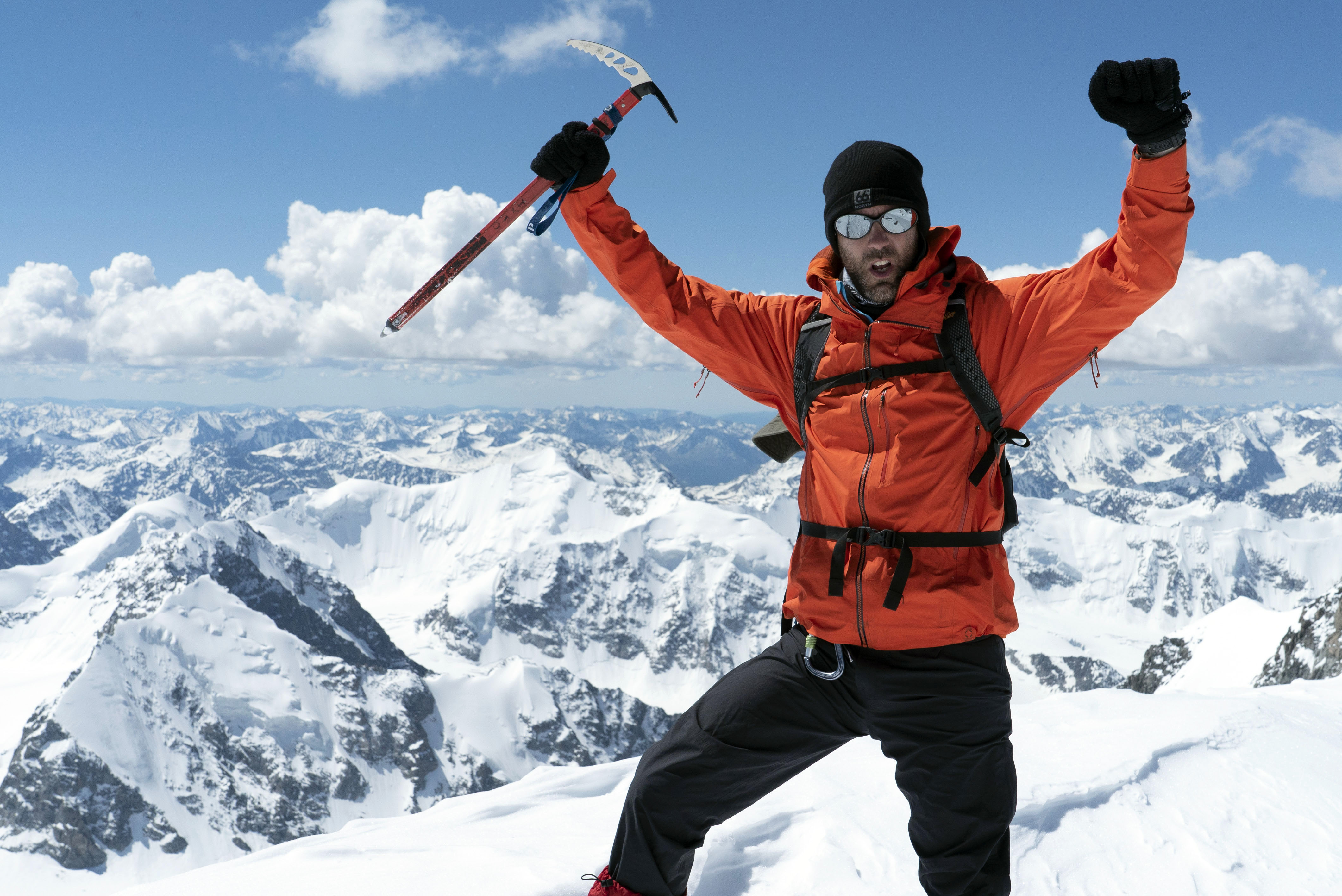 Ryan Pyle at the top of the Khuiten Peak