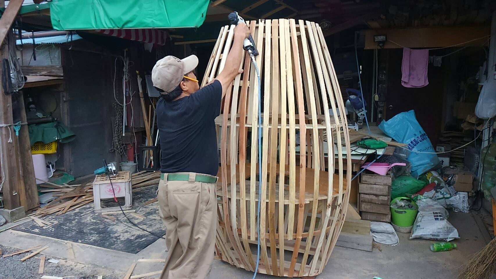 The base of the statue is made from wood.