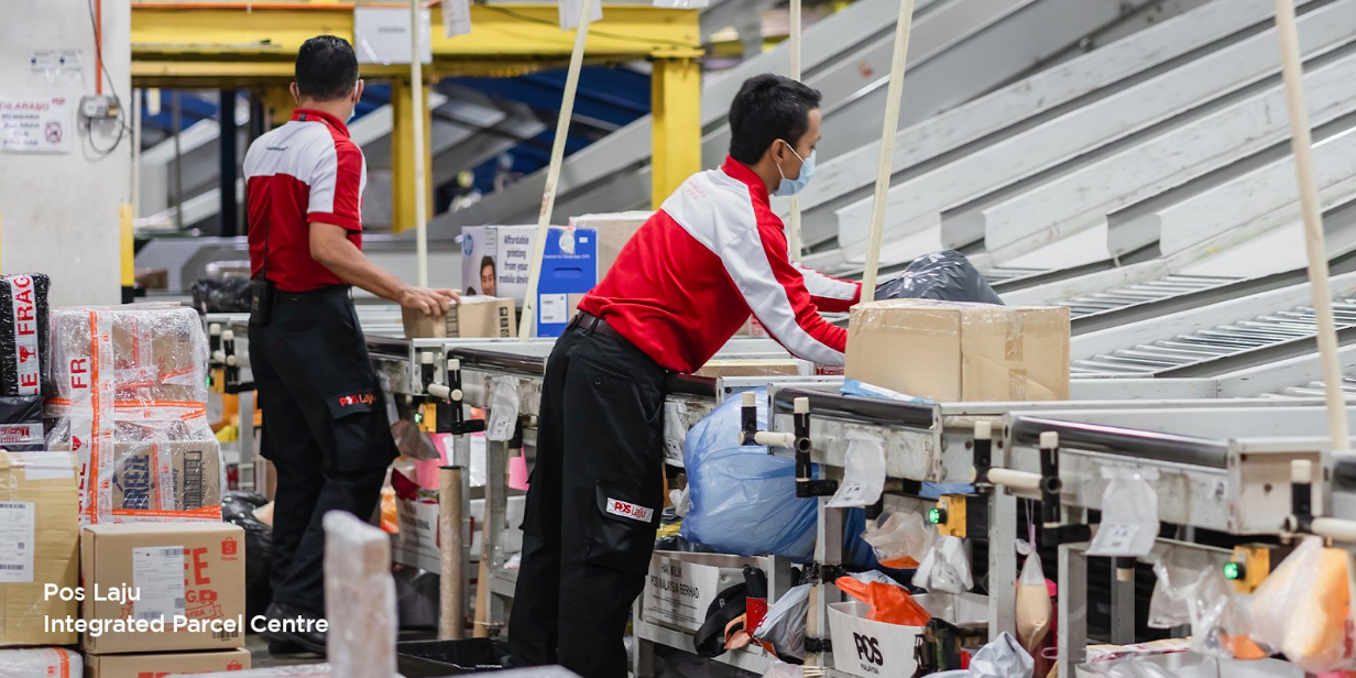 Pos Malaysia Working hard all day, every day to get your parcels delivered.