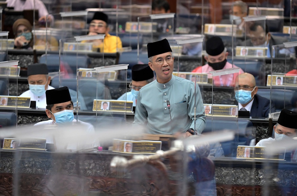Finance Minister tabling the 2021 Budget recently.