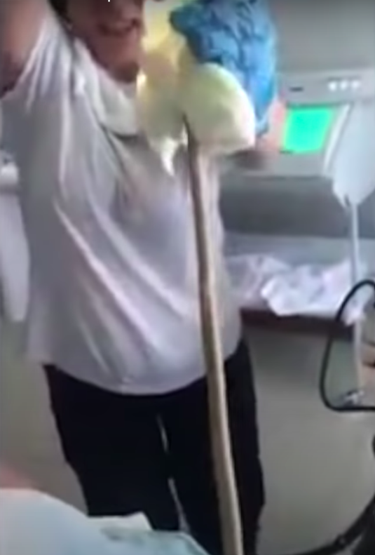 Doctors pulling out the snake.