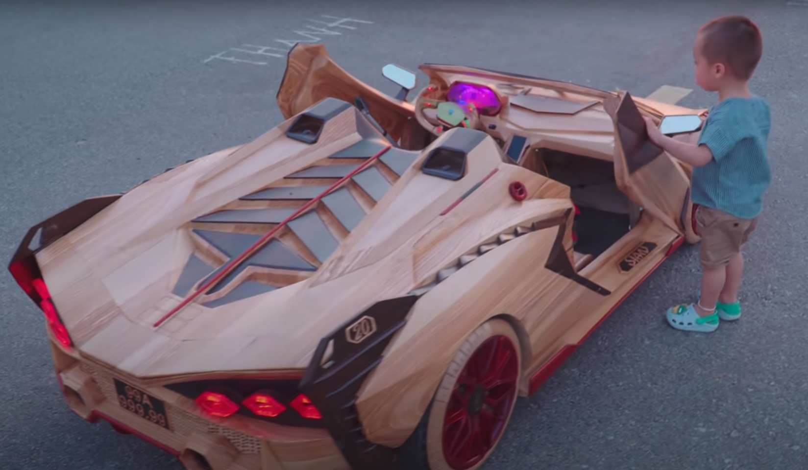 Checking out his Lambo.