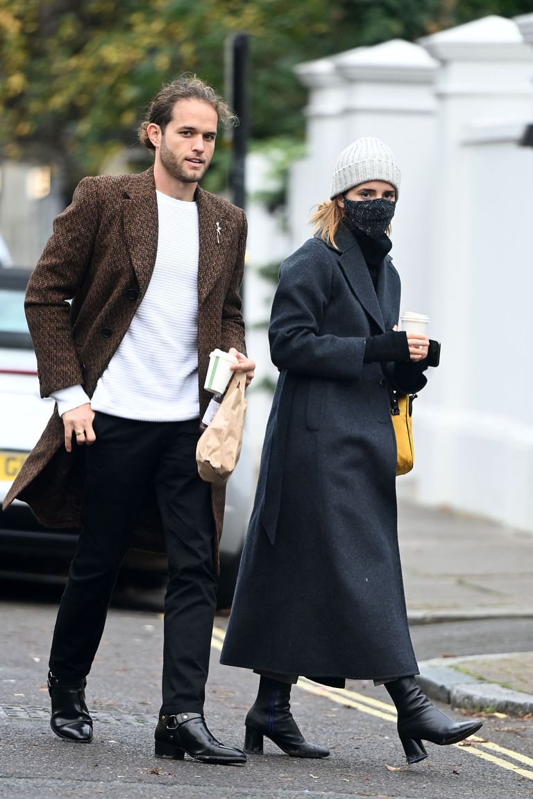Robinton and Watson were photographed out in London's Primrose Hill after grabbing coffee.