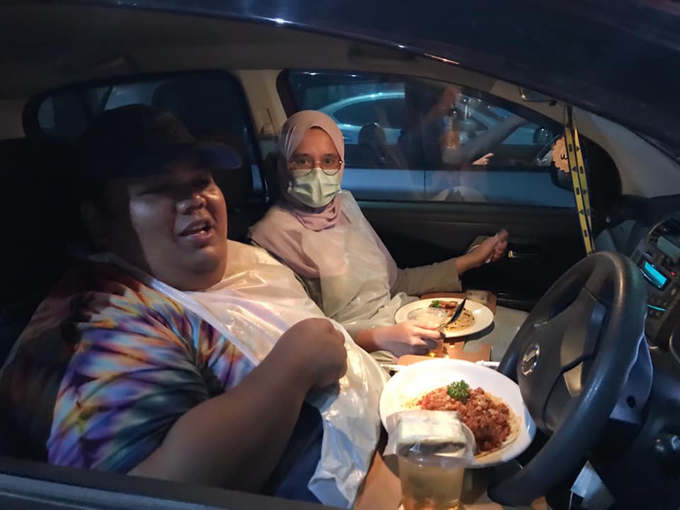 Customers enjoying their meal.