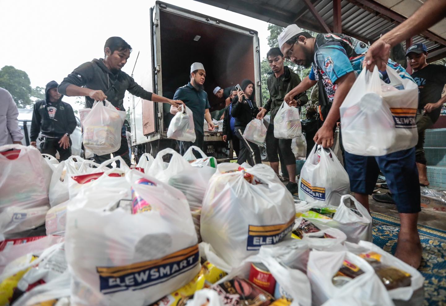 Lew brought along food supplies to the village.