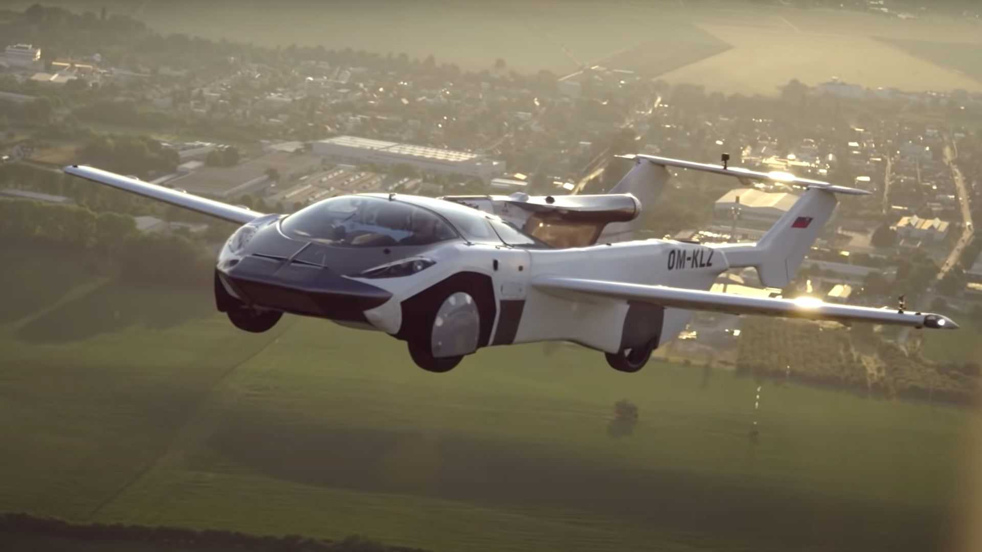 Sports car on road, plane on air.