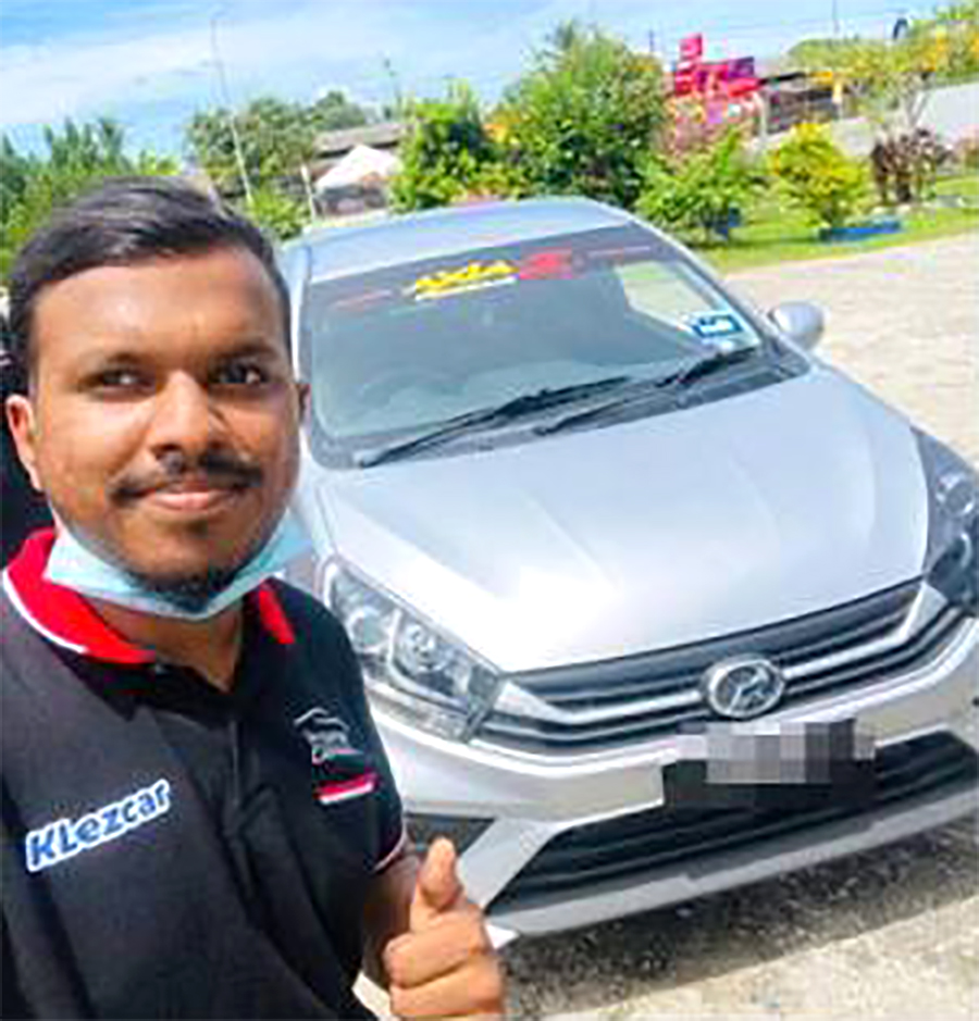 The man and his missing Perodua Axia.