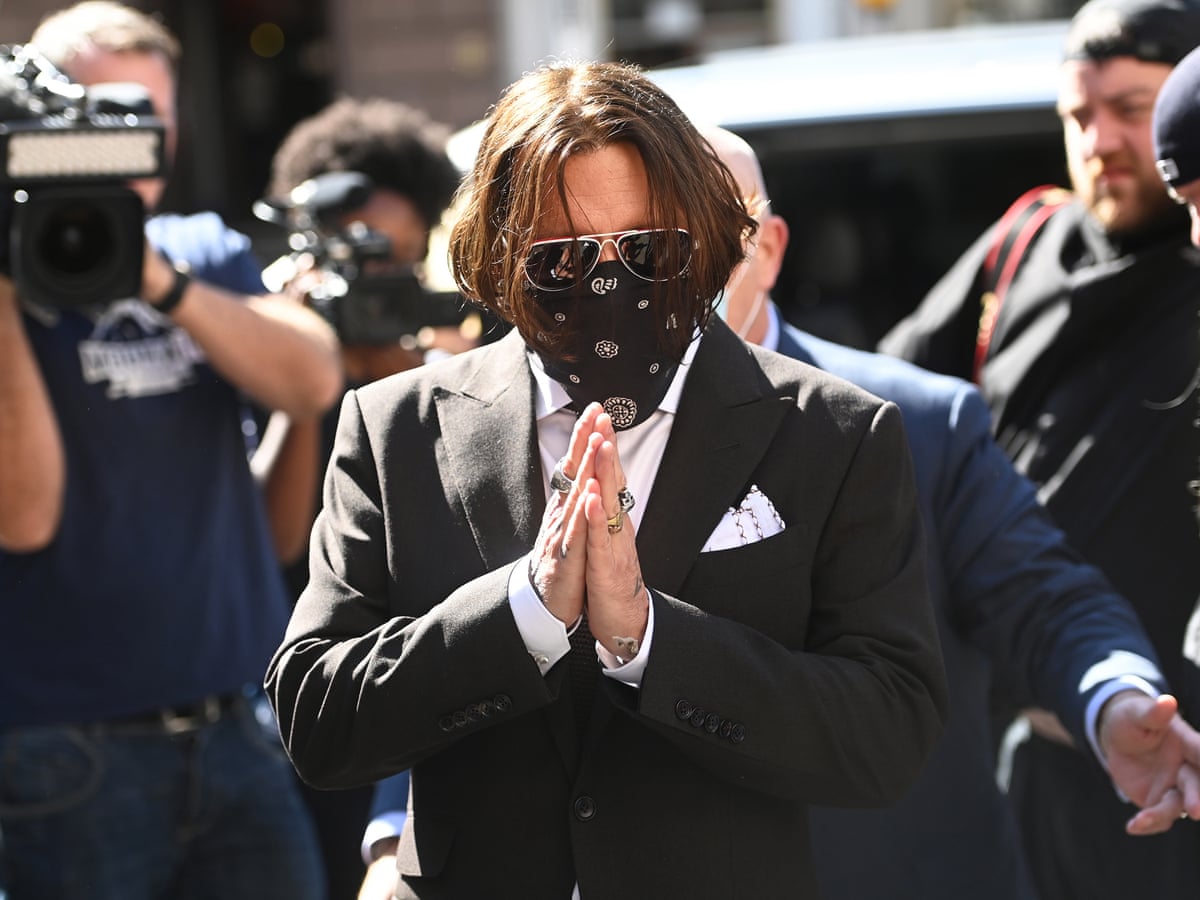 Depp arriving in court for his trial.