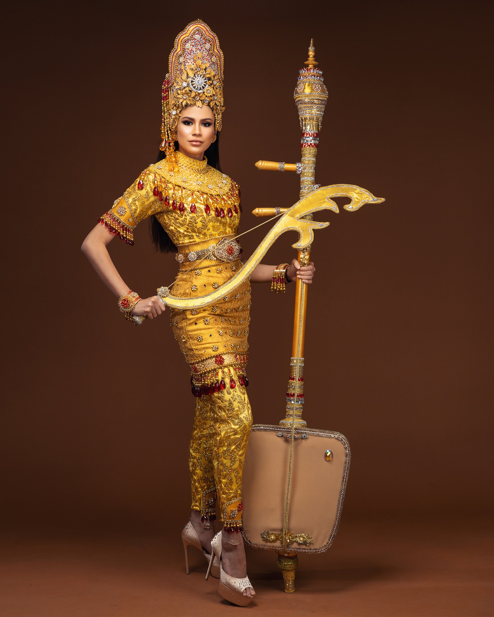 The costume was designed by Ain Mohamad from Kelantan.