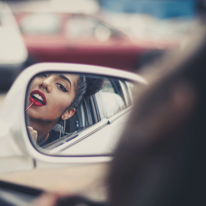 women-putting-lipstick.png