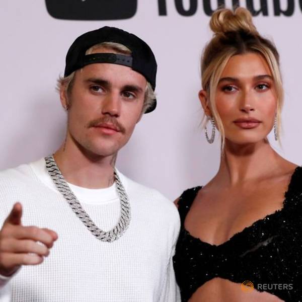 file-photo-singer-bieber-and-his-wife-hailey-baldwin-pose-at-the-premiere-for-the-documentary-television-series-quot-justin-bieber-seasons-quot-in-los-angeles-3.jpg