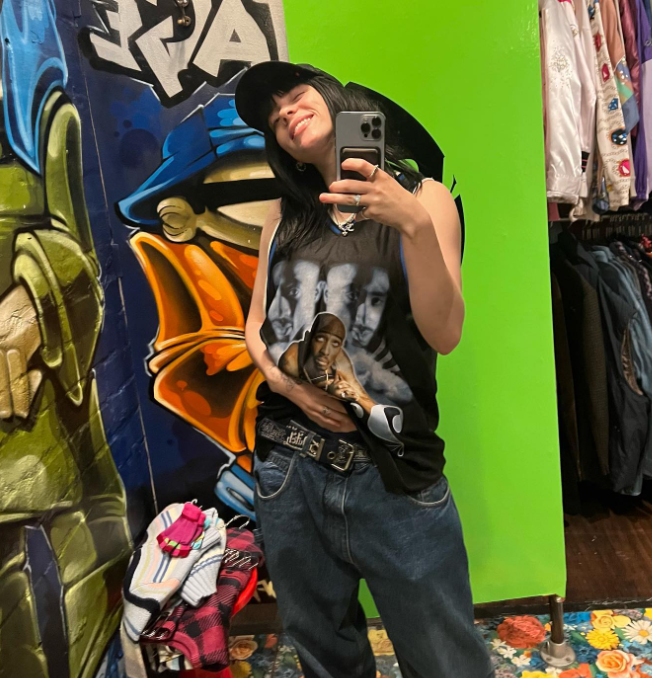 Billie Eilish with iPhone
