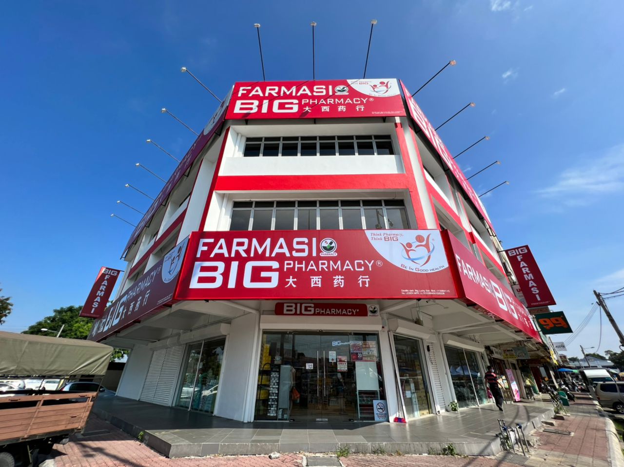 A building with red signs

AI-generated content may be incorrect.
